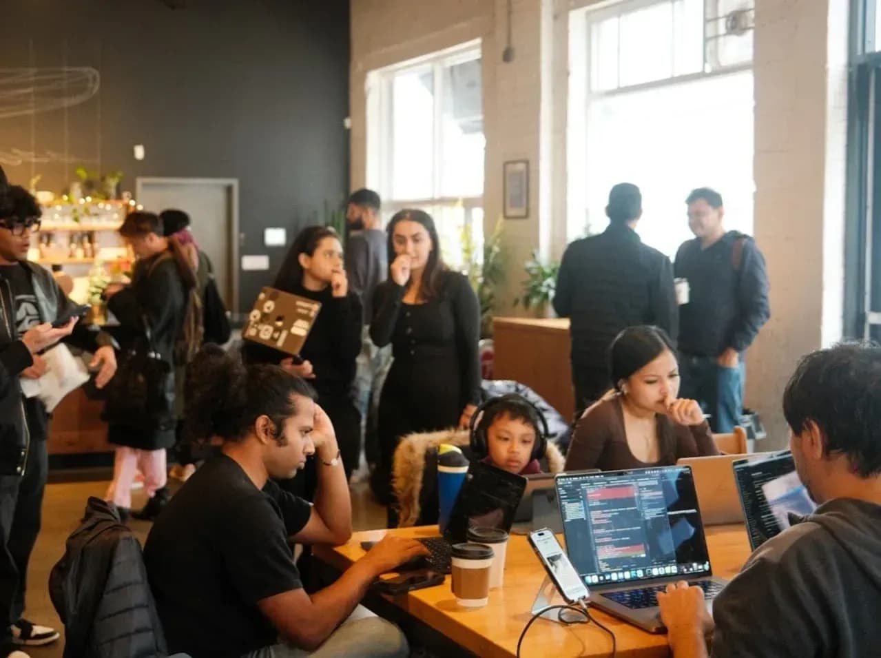 Cursor meetup attendees in discussion